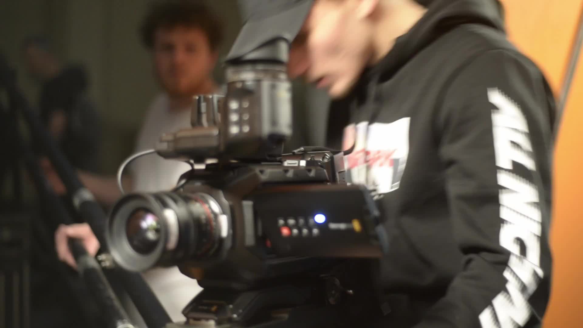 An eNfinity filmmaker behind a Blackmagic cinema camera